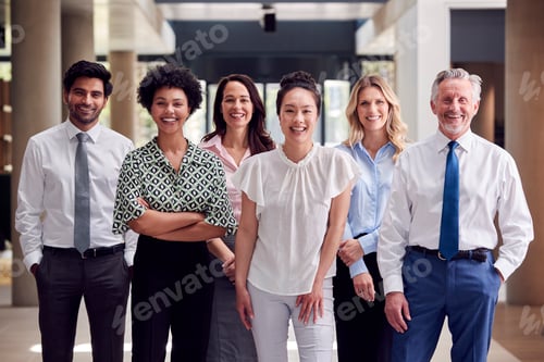 Preview: Portrait Of Smiling Multi-Cultural Business Team Inside Modern Office Building