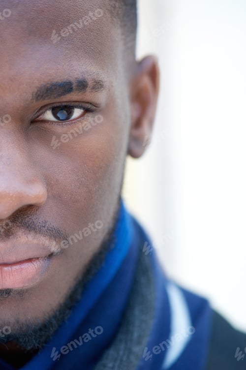 Preview: Half face portrait of an african american man