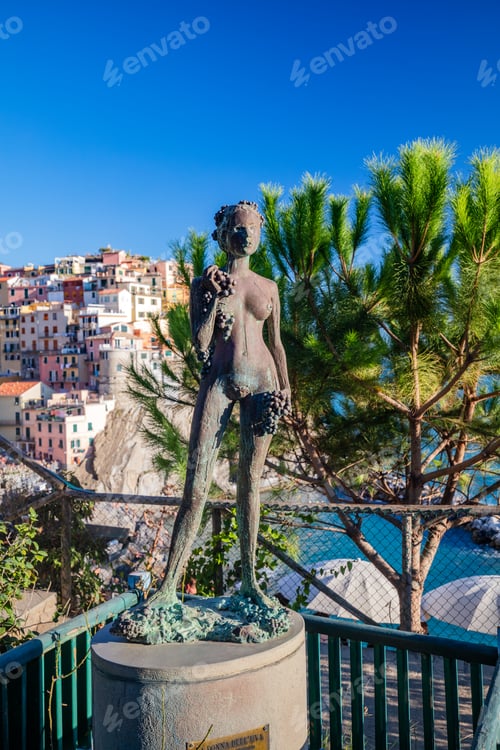 Preview: Manarola in Cinque Terre, Italy. The sculpture of La Donna Dell UVA