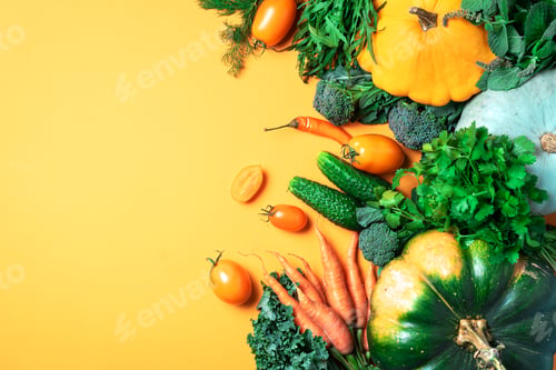 Preview: Autumn vegetables on trendy yellow background. Top view. Vegan and vegetarian diet, harvest concept