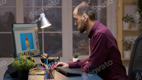 Preview: Bearded professional photographer working in editing app