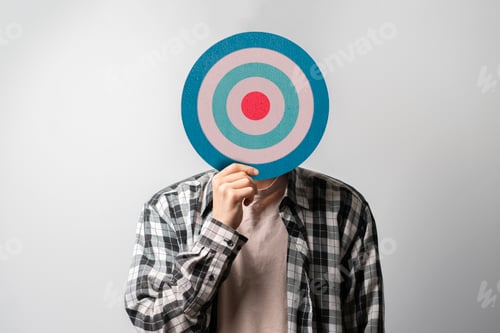 Preview: a person holding target in front of head, internet sales targeting concept