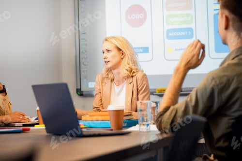 Preview: Portrait of a business woman in the office holding a meeting with a colleague.