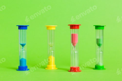 Preview: hourglass on the table, sand clock as time passing concept for business deadline, copy space