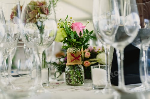Preview: Decoration of the centerpieces of a wedding with the cutlery and vintage details.