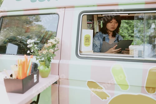 Preview: Food Truck Worker Checking Orders