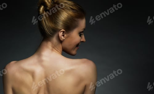 Preview: Back View of Beautiful Woman with Hair Up