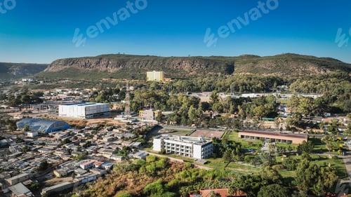 Preview: Aerial view of Lubango City showcasing urban scenery and mountainous backdrop in Angola