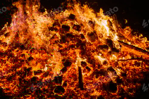 Preview: Burning coals from a fire abstract background.