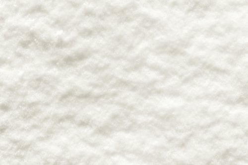 Preview: Abstract Textural Background Of A Grained Snow Surface Of Cream Color