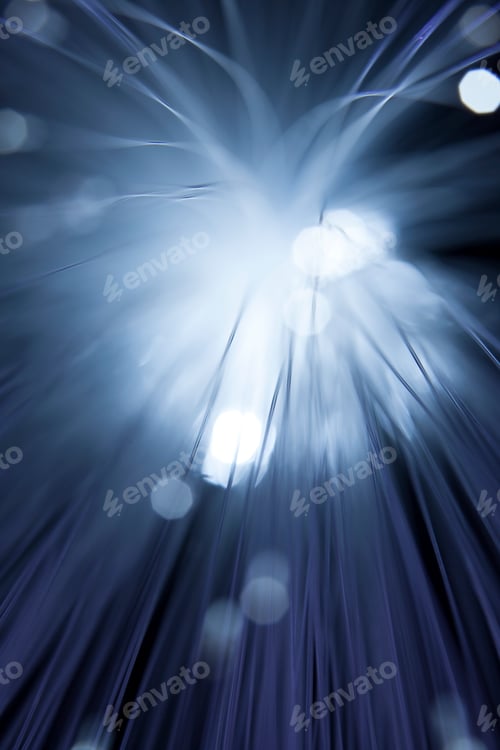 Preview: Close up of illuminated fiber optic light exploding outwards
