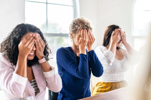 Preview: Diverse businesswomen having fun in a meeting