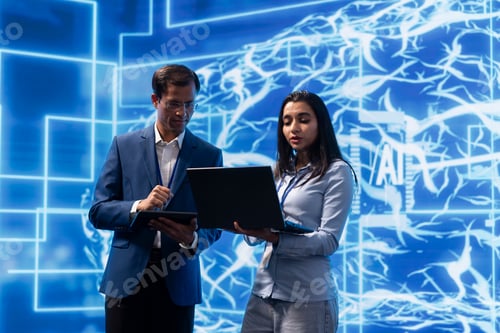 Preview: Researchers collaborating on developing AI system in high tech workspace