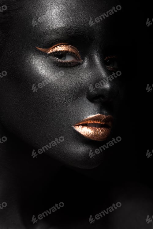 Preview: fashion portrait of a dark-skinned girl with color make-up. Beauty face.