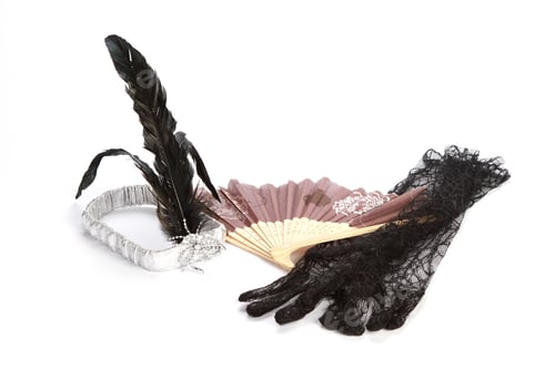 Preview: Paper fan next to transparent gloves and a bracelet on a white surface
