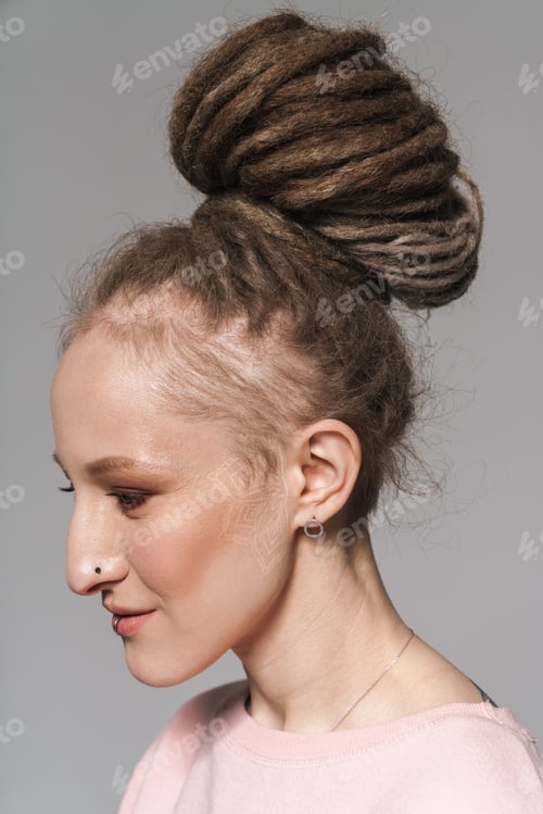 Preview: Woman Profile with Dreadlocks and Delicate Tattoo