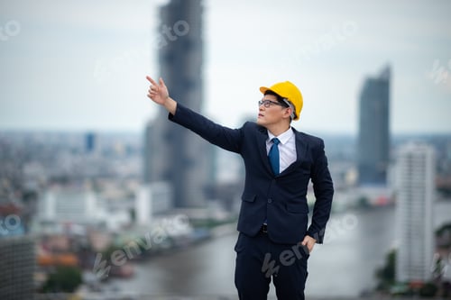 Preview: male adult engineer or professional businessman standing for concept of business industry