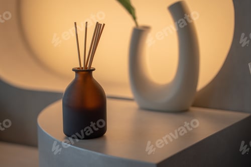 Preview: aromatherapy and home perfume concept - aroma reed diffuser on wooden shelf