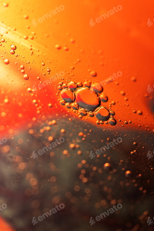 Preview: Oil in water, abstract background in yellow and red color tones