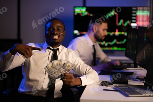 Preview: Holding Dollar bills in the stock market. Investor counting money