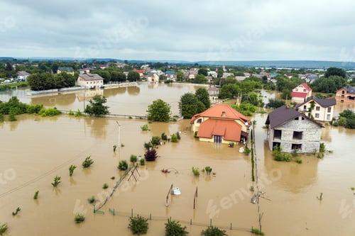 Preview: Aerial view of flooded houses with dirty water of Dnister river in Halych town, western Ukraine.