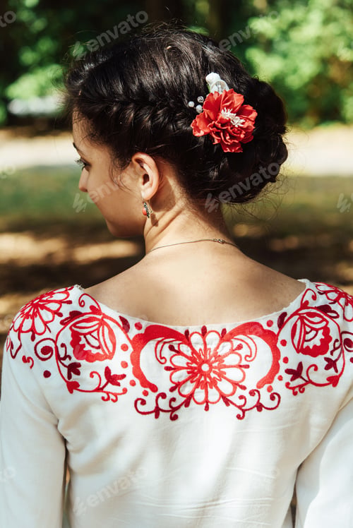 Preview: happy gorgeous bride portrait in wedding day on a background of amazing sunny trees in a park