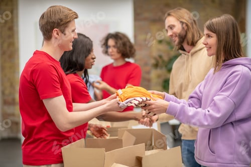 Preview: Workers of the non profit organization distributing donations