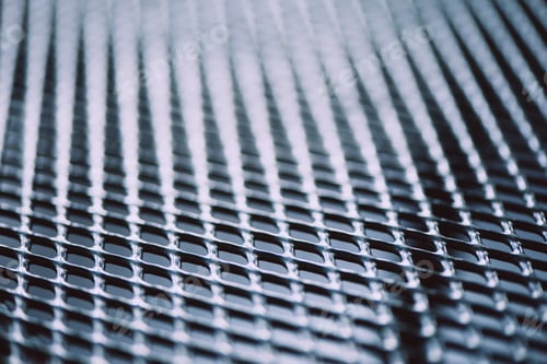 Preview: Metal background. Lattice texture with small cells grid. Selective focus point