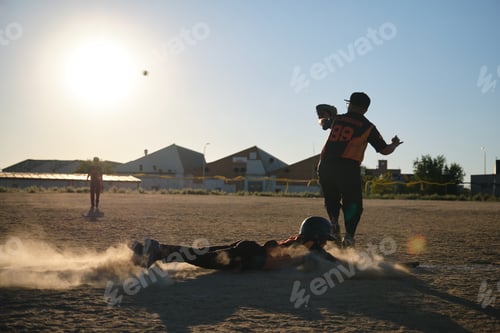 Preview: Baseball player sliding into base creating dust cloud