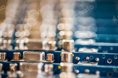 Preview: Close-up blurry metal sockets on a computer video board
