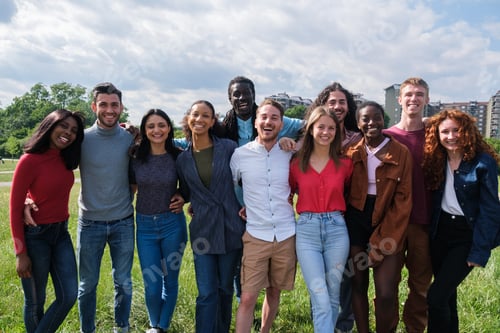 Preview: Group of young people from different cultures having a fun time in the park