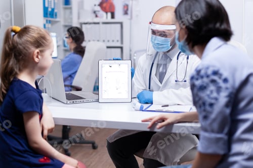 Preview: Pediatrician showing skeleton