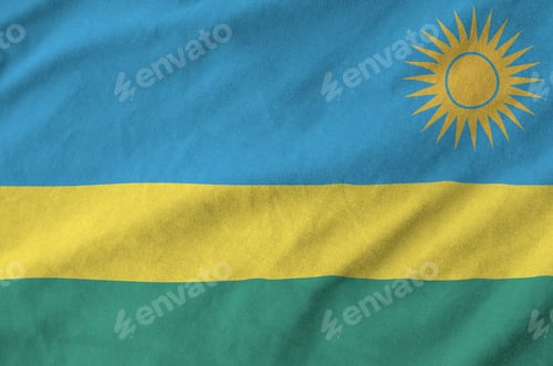 Vorschau: Ruanda-Flagge abgebildet auf gefaltetem gewelltem Stoff aus altem Stoff