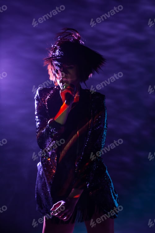 Preview: Stylish woman singing on stage