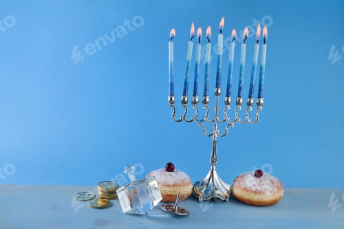 Preview: Jewish holiday Hanukkah with menorah, traditional Candelabra, donut and dreidel, spinning top.