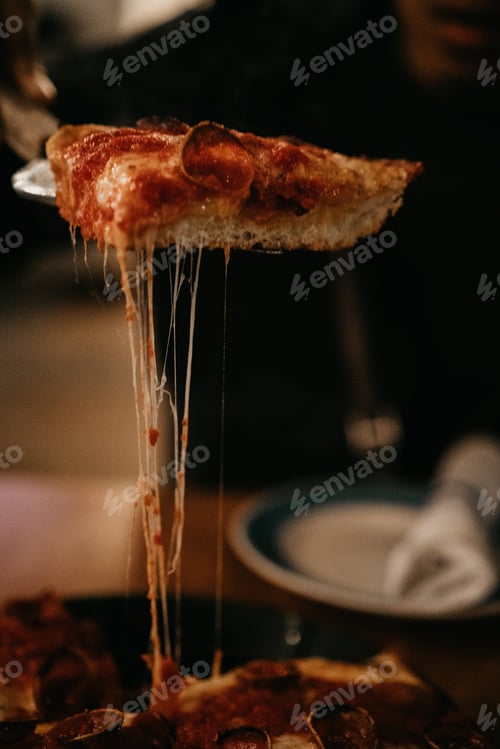 Preview: Cheese pull slice pizza eating dining out restaurant gooey yummy delicious moody pepperoni hot pie