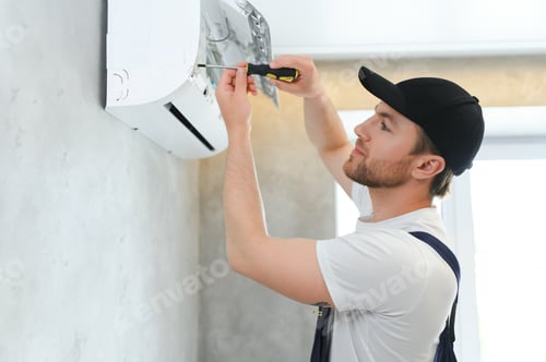 Preview: Service man is cleaning, repair and maintenance of air conditioner.