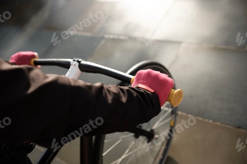 Preview: Point of view of woman riding a bike in the city.