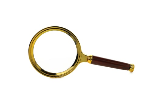 Preview: A magnifying glass in a golden frame, isolated on white background