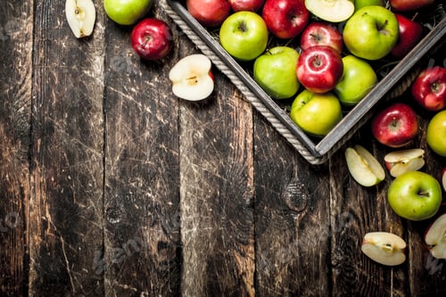 Preview: box with fresh red and green apples.