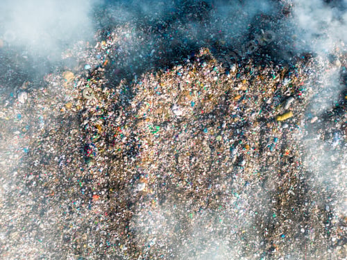 Preview: Aerial view of landfill with burning trash piles