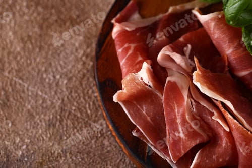 Preview: organic parma ham dry cured jamon on a wooden board