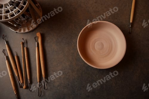 Preview: close up dirty hands of a man woman potter, creating an clay earthen jar pot
