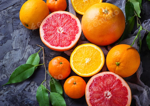 Preview: Dissected fresh fruits. Orange, grapefruit and tangerines