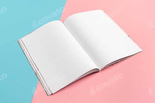 Preview: Blank sketchbook on pink and blue background invites creativity and inspiration