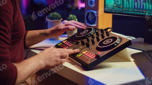 Preview: Sound engineer mixing and mastering sounds with electronic audio console