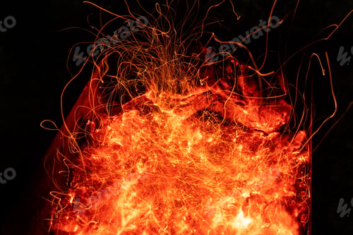 Preview: Top above overhead detail view od abstract hot red burning wooden coal background in bbq grill