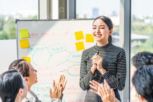 Preview: Asian smart woman present work and got praise and complement from team colleague in office
