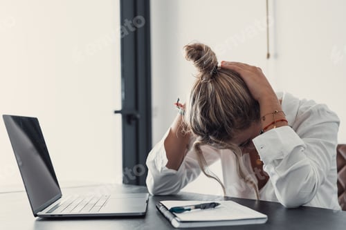 Preview: Stressed tired woman in pain having strong terrible headache attack after computer