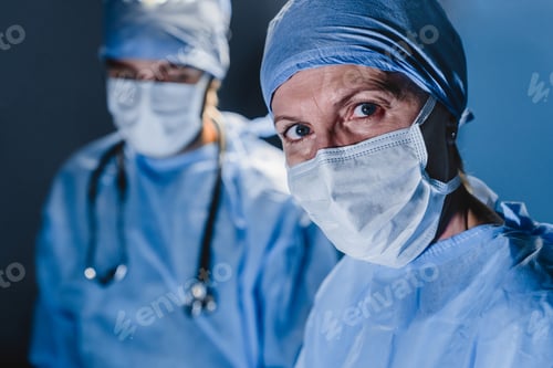 Preview: Medics during surgery in operation theater.